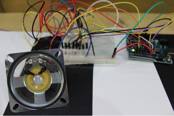 The Arduino, breadboard circuit, and speaker