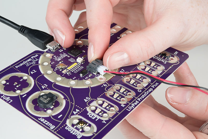 To recharge an battery, plug board into a USB