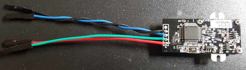 twist the black and blue wires in a clockwise pattern 