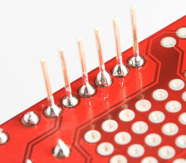 solder-remaining-four-pins-into-place_31