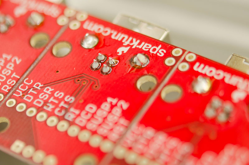 water-soluble flux residue left on a production panel