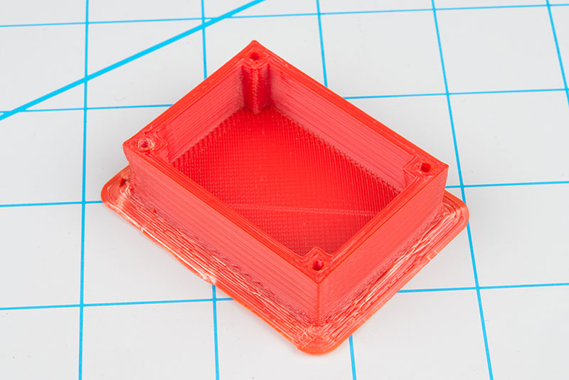 Use a a flat object to pry the parts off the print bed