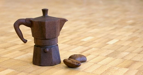 tiny coffee pot was milled out of walnut wood