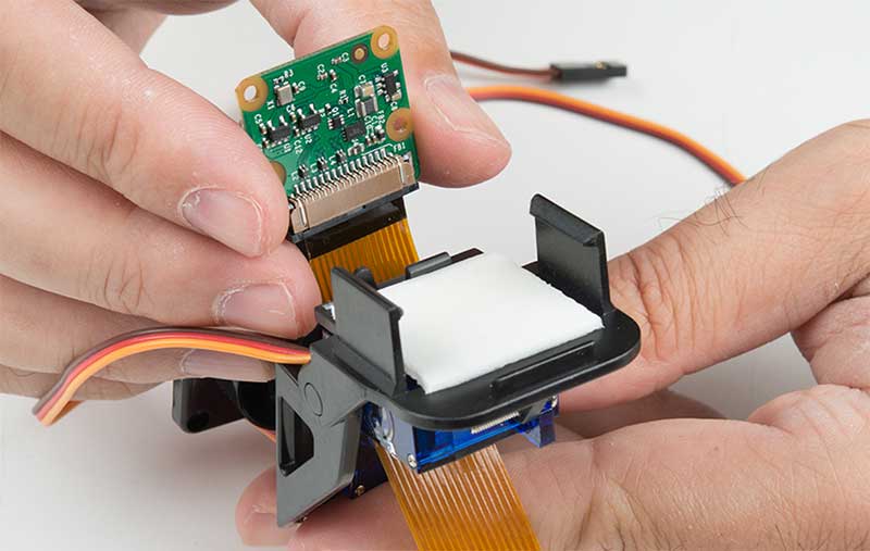 Threading the camera flex cable