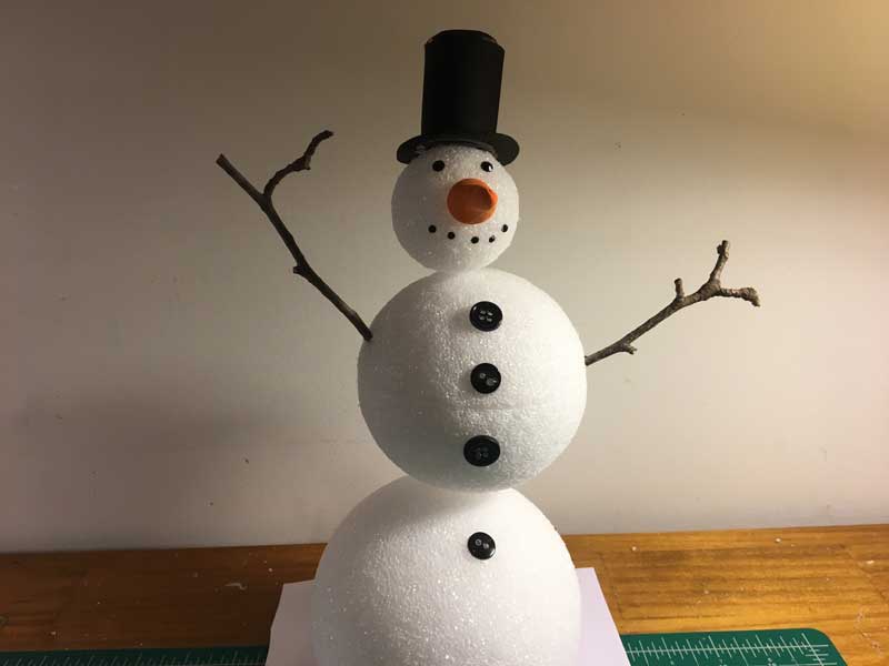 Adding the snowman body and facial features