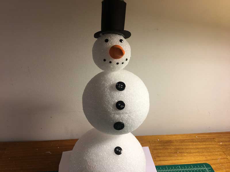 Adding the snowman body and facial features