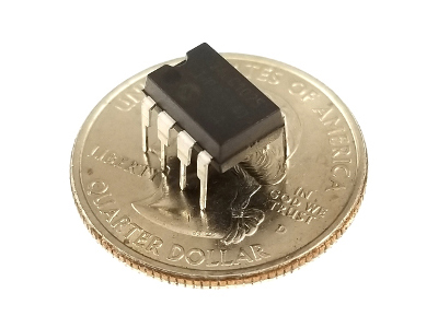 EEPROM IC with a US quarter for size comparison