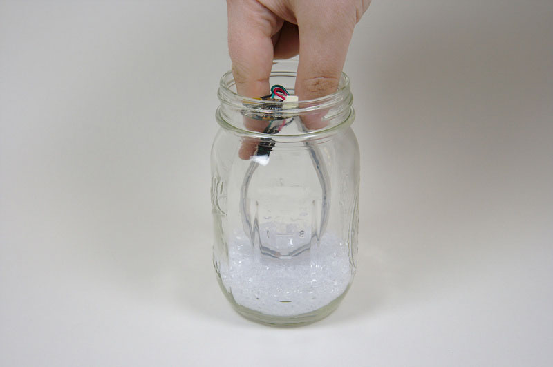 Hold Bent U Shaped NeoPixel in Center of Jar and Fill