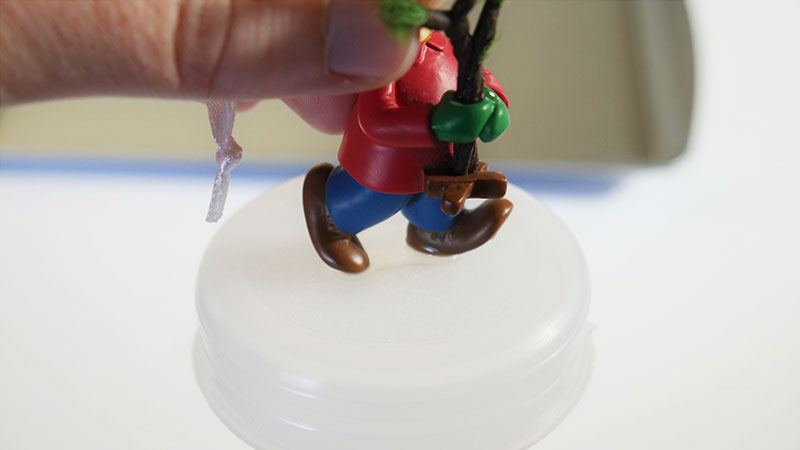 glue your item onto the inner base of snow globe