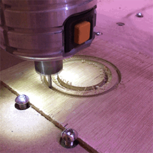 The CNC router making the adapter ring