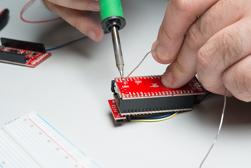 Use base plate to hold headers to ESP32 board