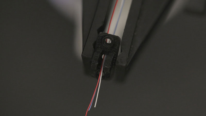 thread the wires from neopixel ring through center