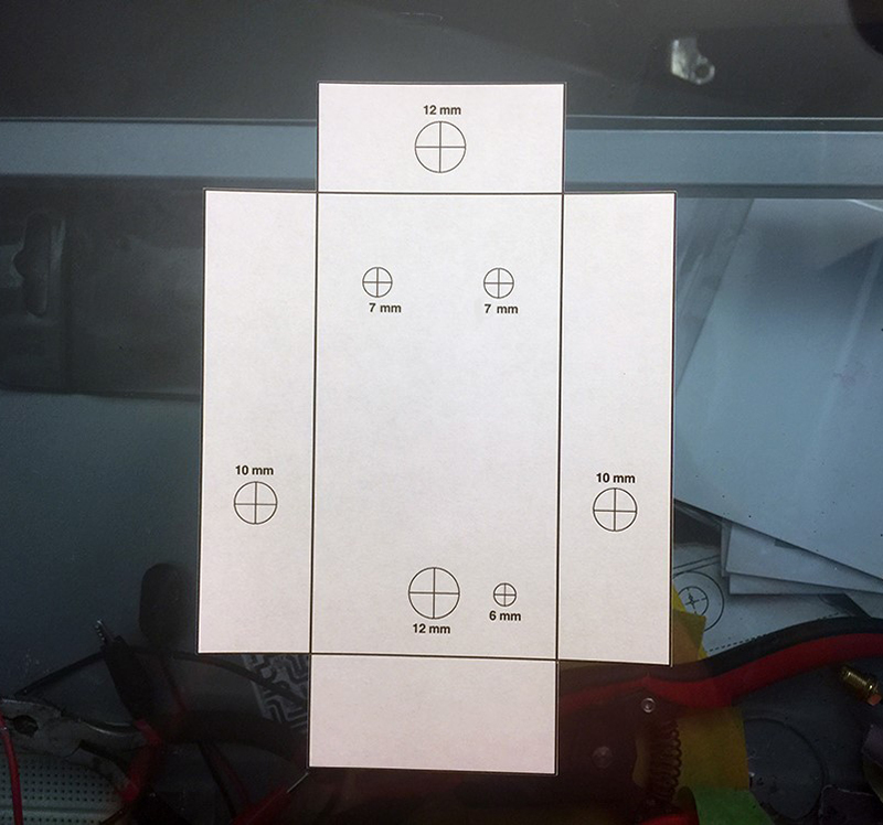 Print out the 1590B enclosure template on paper 