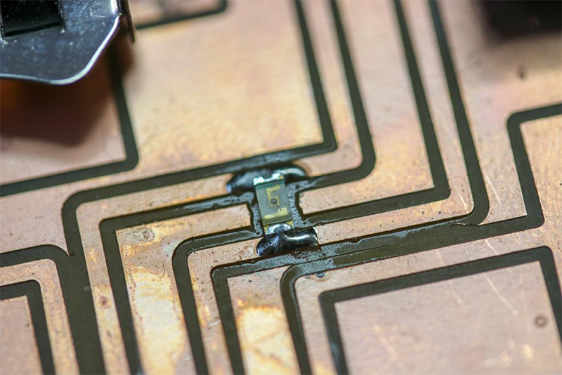 Solder the itty-bitty surface-mount LED