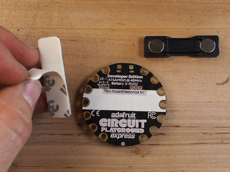 Affix pin back to Circuit Playground